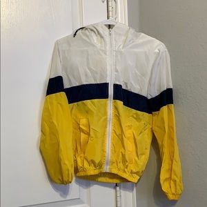 Navy blue, yellow and white windbreaker
